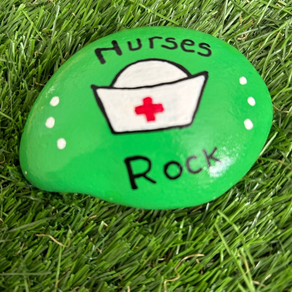 Green Painted Rock with Nurse Design